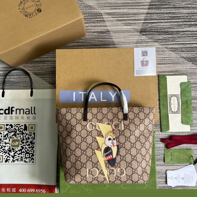 G*u*i shopping bags